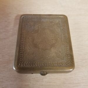 Intricate Gold Metal Case